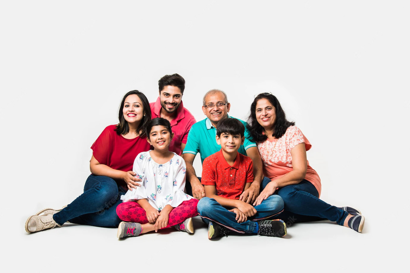 indian-kids-with-parents-grandparents-sitting-isolated-white-background-studio-shot_466689-44925